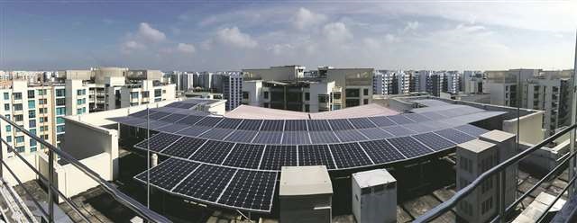 Solar panels on HDB rooftop in Singapore